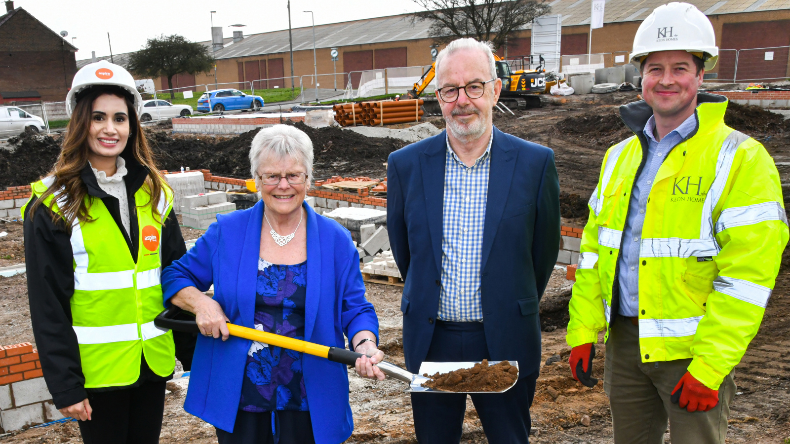 Farmeda Kosar (Director of Development & Regeneration, Aspire Housing, Lilian Barker (Chesterton One Stop Shop), Cllr Kenneth Owen (Mayor of Newcastle-underLyme, and Richard Williams (Managing Director, Keon Homes) pictured at the first phase of the Cross Street development