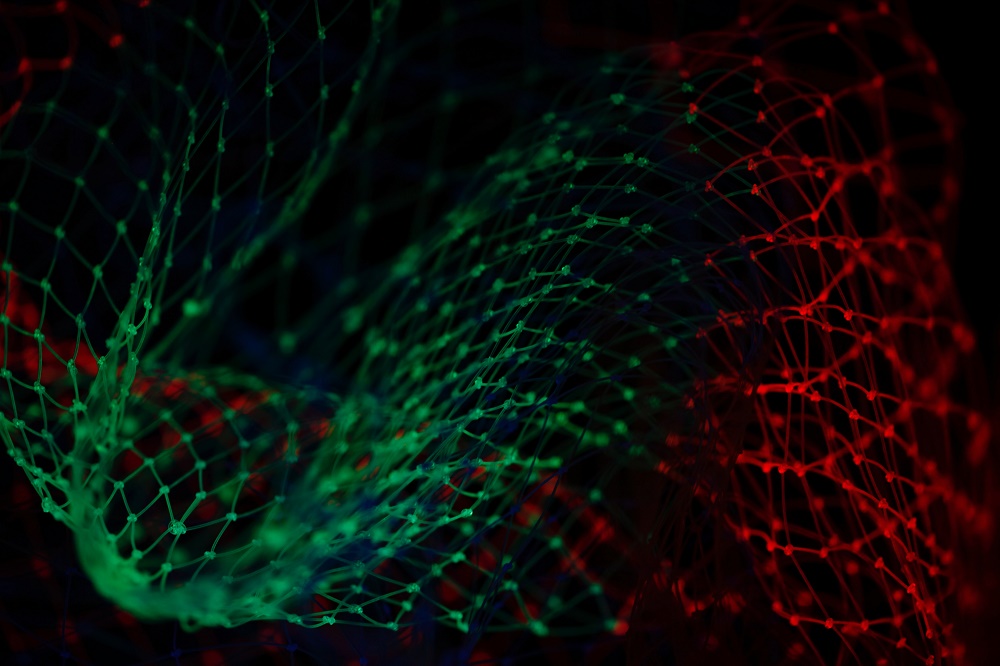 Abstract digital pattern in red and green against a black background