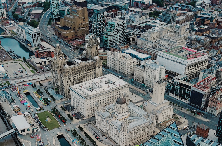 Ariel shot of Liverpool city centre and the water front including the liver buildings