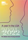 A mix of light yellow, orange and turquoise with two line drawn face silhouette's with the text: A year on the LGA 2021-22, the national voice of local government